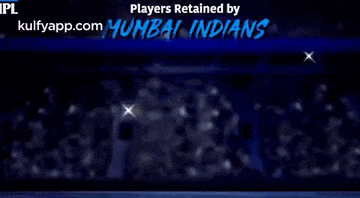 four players for the mumbai indians are shown in blue uniforms