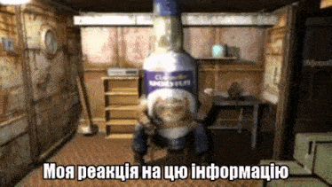 a man sits in a chair with a bottle of vodka behind him