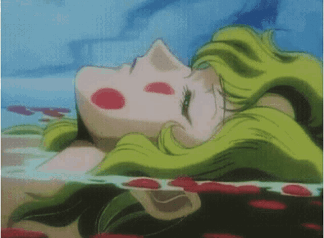 a woman with green hair is laying in the water with red roses on her face