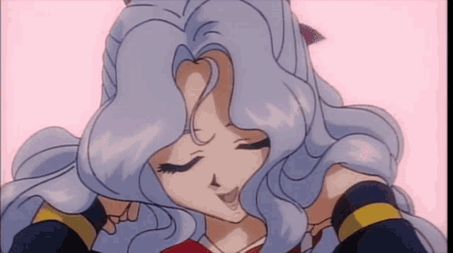 a close up of a cartoon girl with long white hair and a red bow on her head .