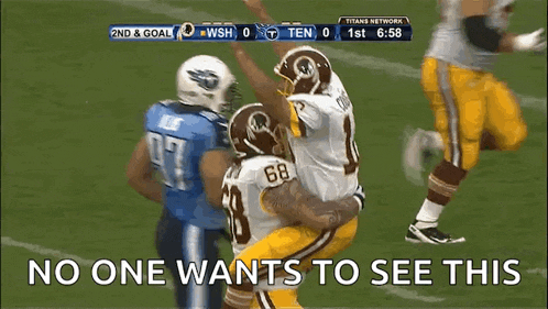 a football game between the titans and the redskins