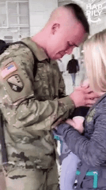 a man in a military uniform with a patch that says airborne
