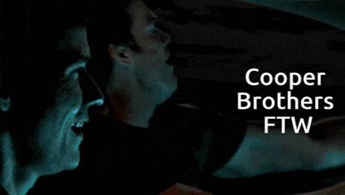 a poster for the cooper brothers ftw shows two men in the dark