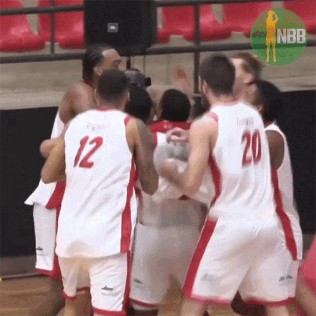a group of basketball players including number 12 and 20