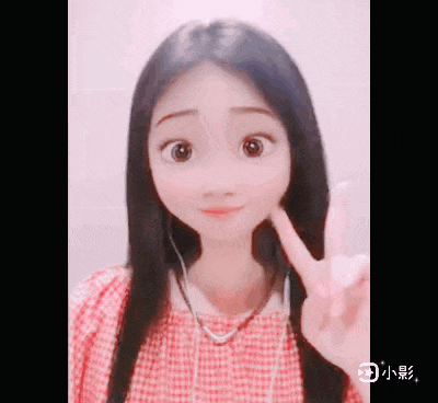 a girl wearing headphones and a red plaid shirt is giving a peace sign .