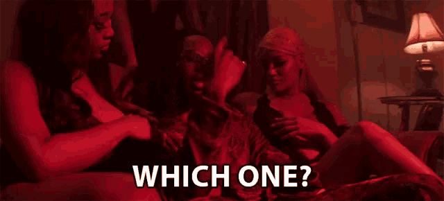 a group of women sitting on a couch with the words " which one " on the bottom