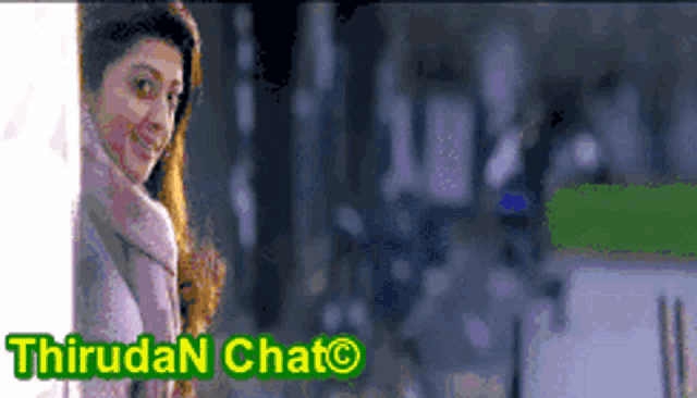 a blurred image of a woman with the words thirudan chat written below her