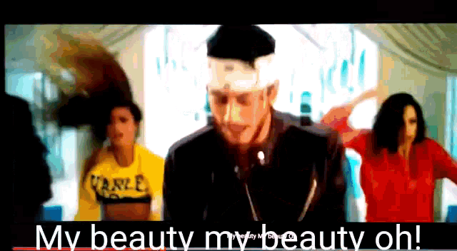 a man with a bandage on his head is surrounded by women and says my beauty my beauty oh !