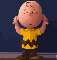 charlie brown from the peanuts movie is standing with his hands up