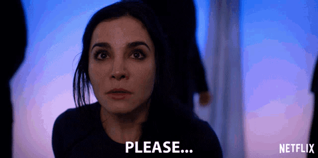a woman says please in a dark room