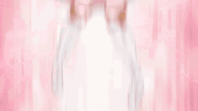 a girl with pink hair is holding a sword in her hand