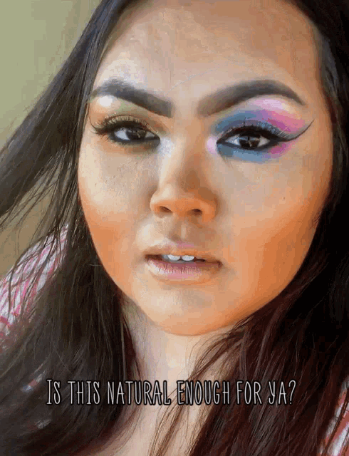 a close up of a woman 's face with the words " is this natural enough for ya " below her