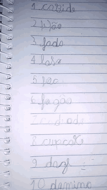 a notebook with the numbers 1 through 10 in cursive