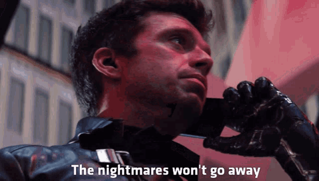 a man talking on a cell phone with the words " the nightmares won 't go away " written below him
