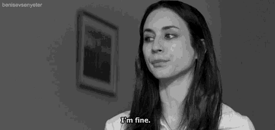 a black and white photo of a woman with a caption that says i 'm fine