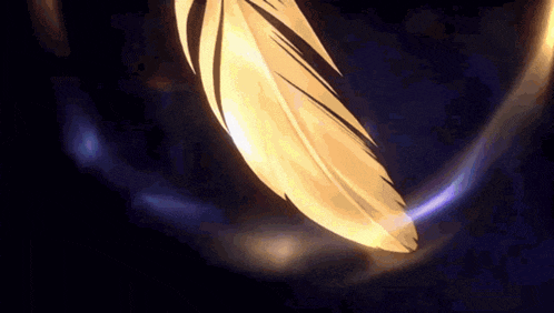 a yellow feather is floating in the air with a blue light behind it