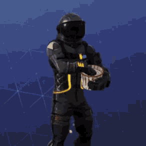 a man in a black suit and helmet is holding a baseball glove ..