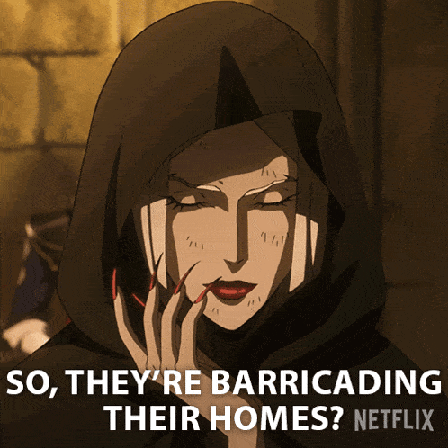 a woman with red nails and a black hood says " so they 're barricading their homes "