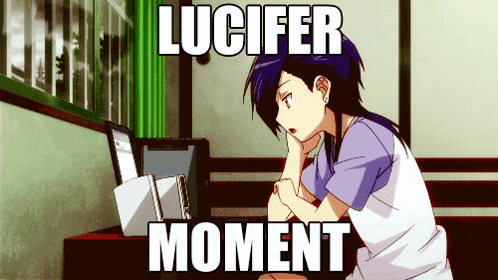a girl is sitting in front of a laptop with the words " lucifer moment " below her