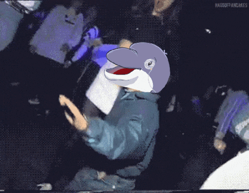a cartoon of a dolphin wearing a suit and a mask with the words narwosepancakes at the bottom