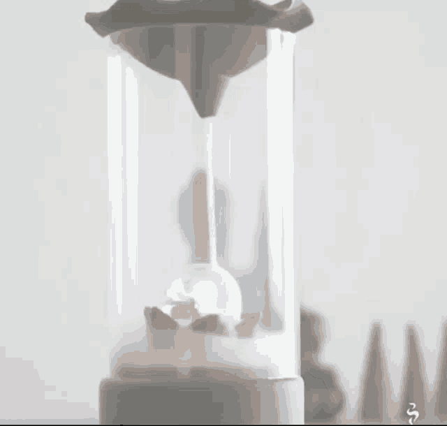a glass container with a globe in it