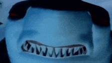 a close up of a person 's face with a shark 's teeth on it .