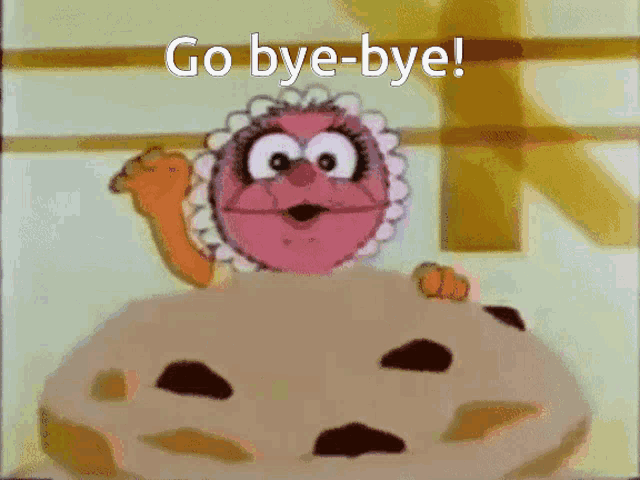 a cartoon character says go bye-bye while standing on a cookie