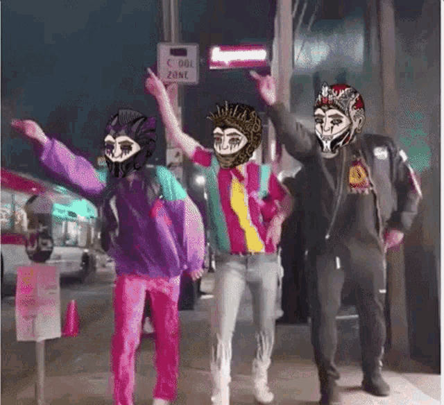 a group of people wearing masks are dancing on the sidewalk .
