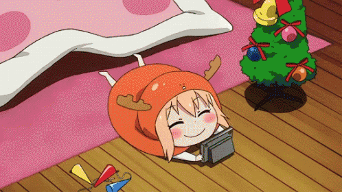 a cartoon character is laying on the floor with a christmas tree in the background .