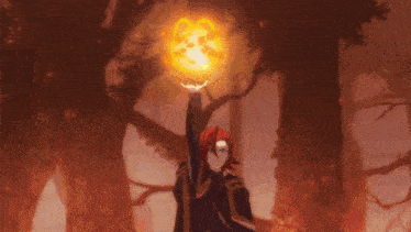 a person with red hair is holding a glowing object in their hand