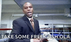 a man in a suit and tie says take some free cash 'ola