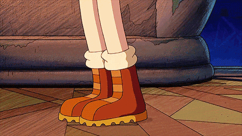 a cartoon character is wearing a pair of brown boots with yellow soles