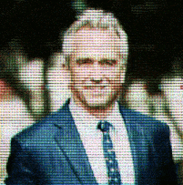 a man in a suit and tie is shown on a screen