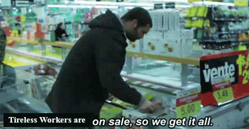 a man in a store with the words tireless workers are on sale so we get it all below him