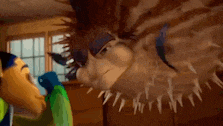 a couple of cartoon characters are standing next to each other in a room with a hedgehog hanging from the ceiling .