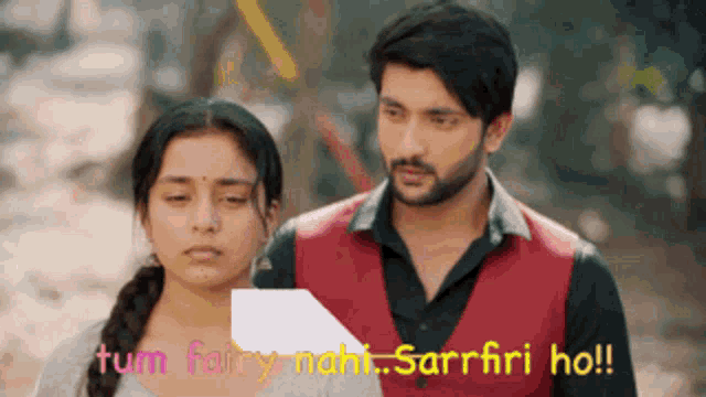 a man and a woman are standing next to each other with the words tum fairy nahi sarrfri ho written above them