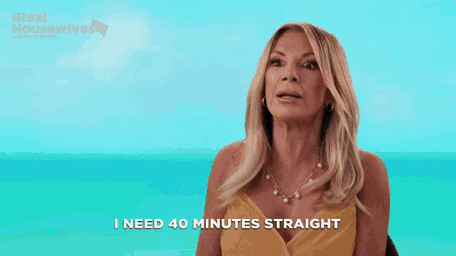 a woman says i need 40 minutes straight in front of a blue background