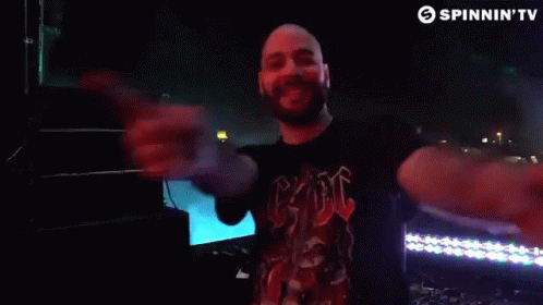 Pointing Tune In GIF - Pointing Tune In Rave Crowd GIFs