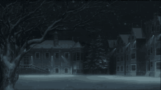 a snowy night scene with a large building in the background