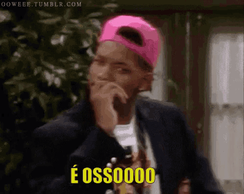 a man wearing a pink hat and a black jacket says e ossooo