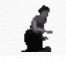a black and white image of a gun on a white surface .
