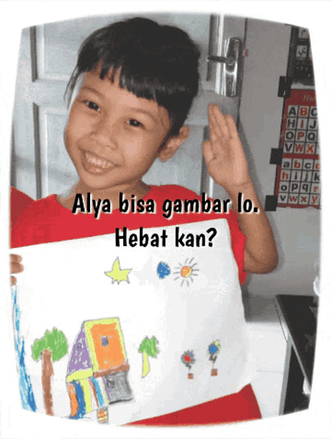 a little girl holds up a drawing with the words alya bisa gambar lo