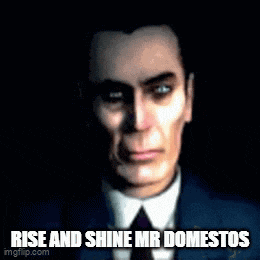 a man in a suit and tie with the words rise and shine mr domestos written below him .