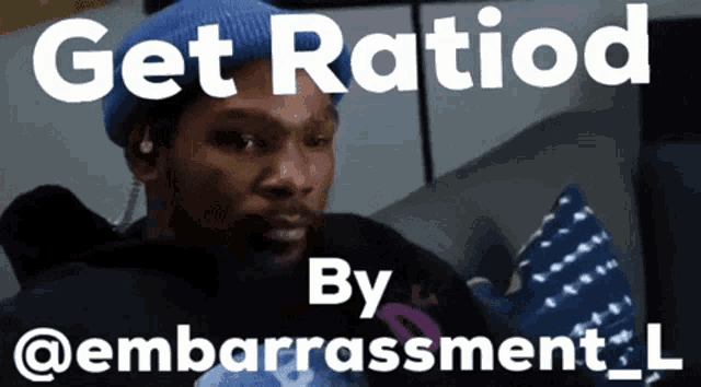 a man is sitting on a couch with the words get ratiod by @embarrassment_l