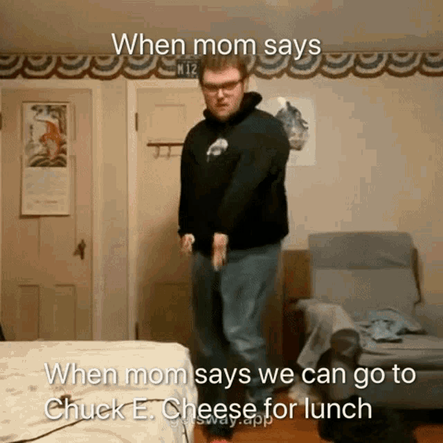 a man is dancing in a living room with the caption when mom says we can go to chuck e cheese for lunch .