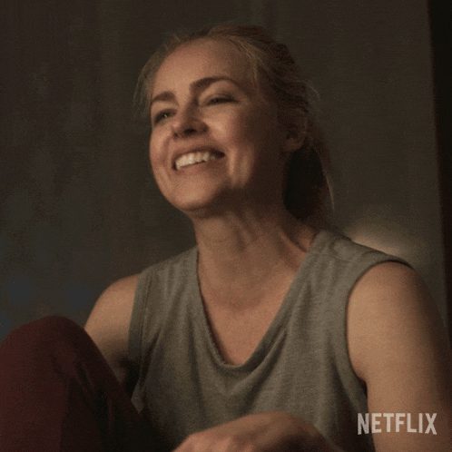 a woman is smiling in a netflix advertisement