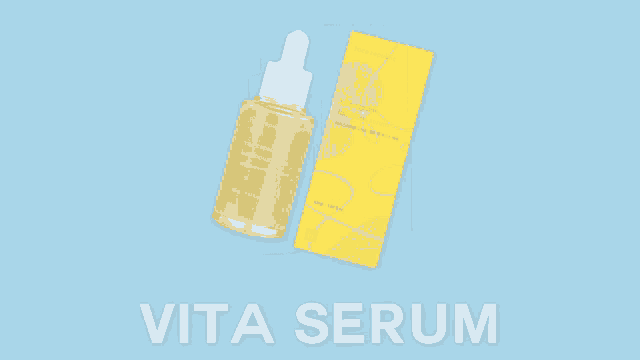 a bottle of vita serum next to a box