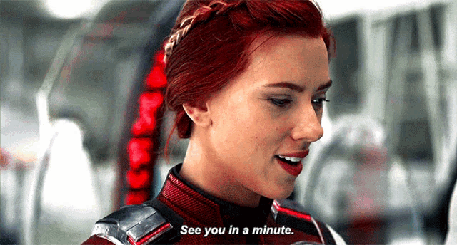 black widow is talking to someone and saying `` see you in a minute '' .