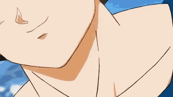 a close up of a person 's arm with a blue shirt on a yellow background .