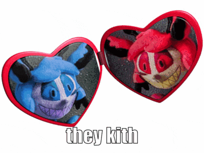 a pair of heart shaped mirrors with the words they kith written on the bottom
